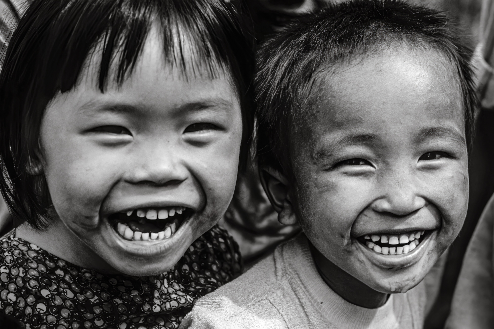 Two young children laughing, 1992 / Hai đứa trẻ đang cười, 1992